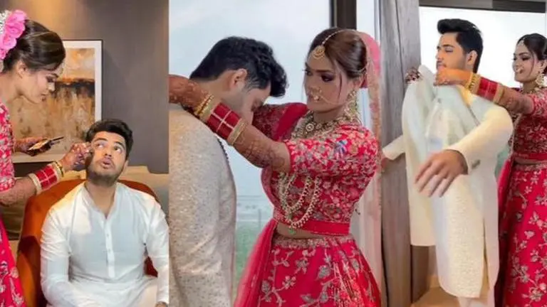 Bride helps her Groom get ready on their wedding day; watch viral video here Bride