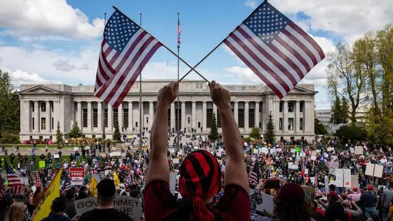 Chicago protesters demand end to staying at home
