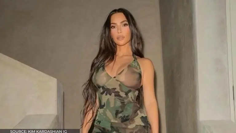 Kim Kardashian 'throws it back to 2006 thanksgiving'; Fans comment that she hasn't changed Kim Kardashian IG