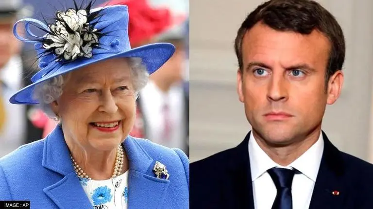 French President Macron signs condolence book for Queen Elizabeth II UK