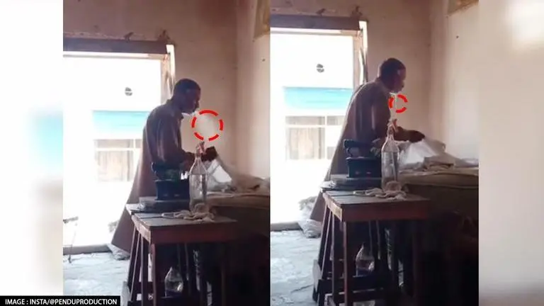 Video shows man spitting on clothes while ironing; 'Fresh clothes' quip netizens ironing