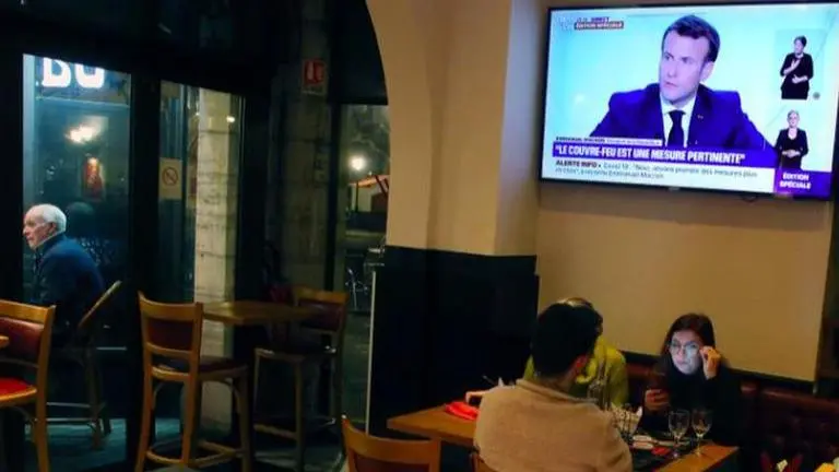 Tighter curfew to dampen holiday spirit in France