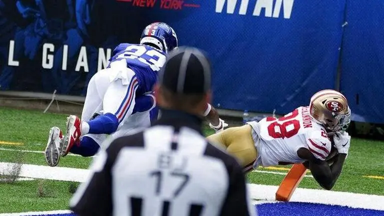 Banged up 49ers win again at MetLife, beat winless Giants