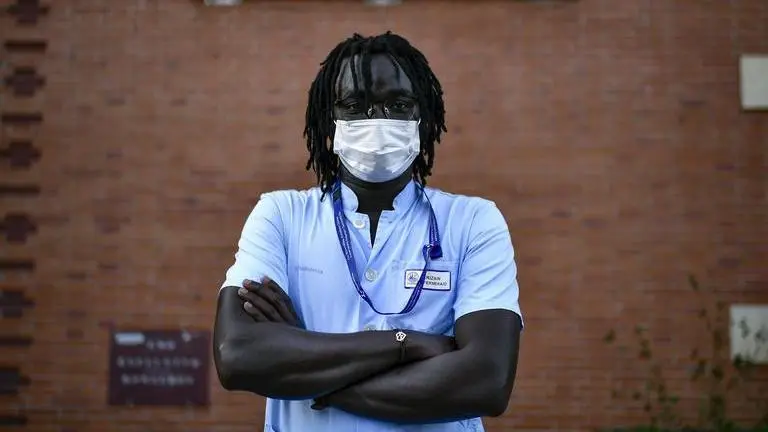 A migrant's odyssey from boat to COVID nursing job in Spain