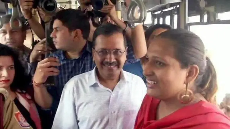 CM Arvind Kejriwal interacts with women commuters in Delhi bus Kejriwal