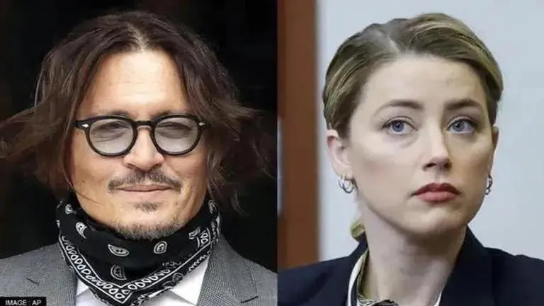 Johnny Depp smiles in courtroom as Amber Heard repeats 'He pushed Kate Moss down' Johnny Depp