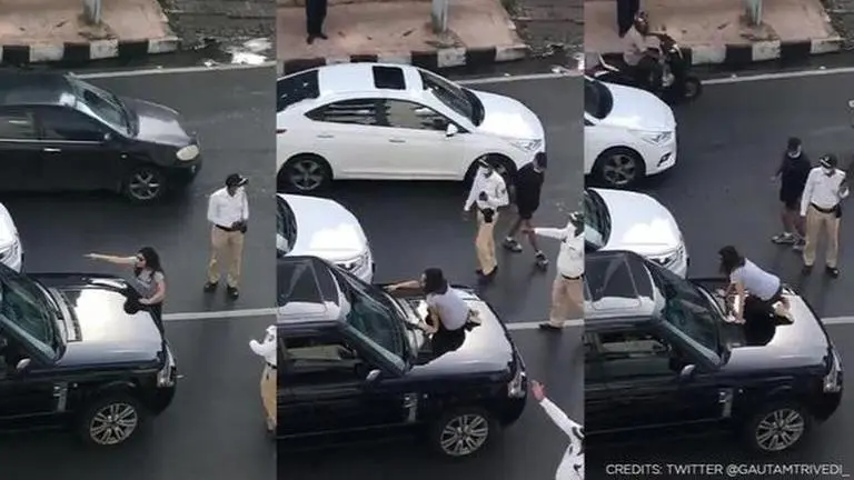 Woman stops husband's car suspecting an affair; blocks traffic on Mumbai's Peddar road Mumbai