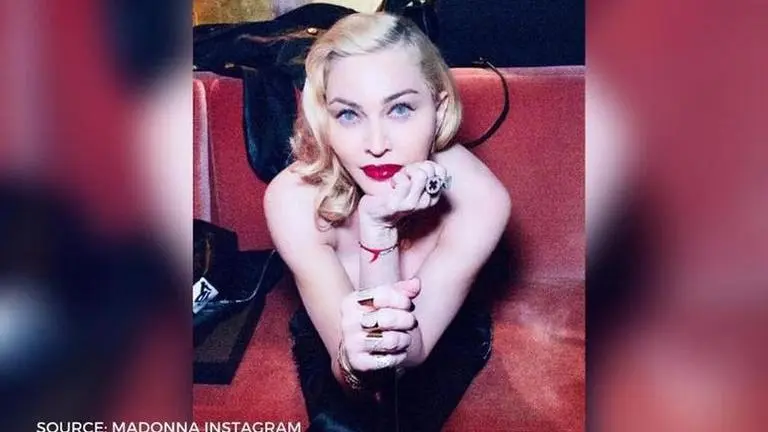 Madonna attends birthday party after testing positive for COVID-19 antibodies Madonna breaks social distancing norm for a birthday party after tested COVID-19 positive