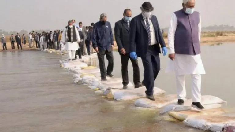 CM Nitish Kumar launches Rs 115 crore Simaria Dham revitalisation project Bihar Chief Minister Nitish Kumar crosses River Chandan during his visit to an archaeological site in Banka district Read more at: https://www.deccan