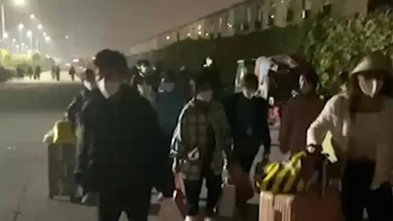 Violent protests break out at iPhone factory in China amid spike in COVID cases China