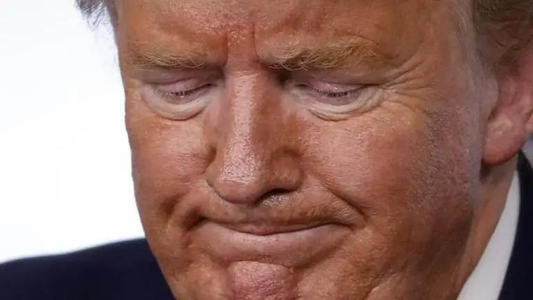 Despite grim projections, Trump resists national quarantine Despite grim projections, Trump resists national quarantine