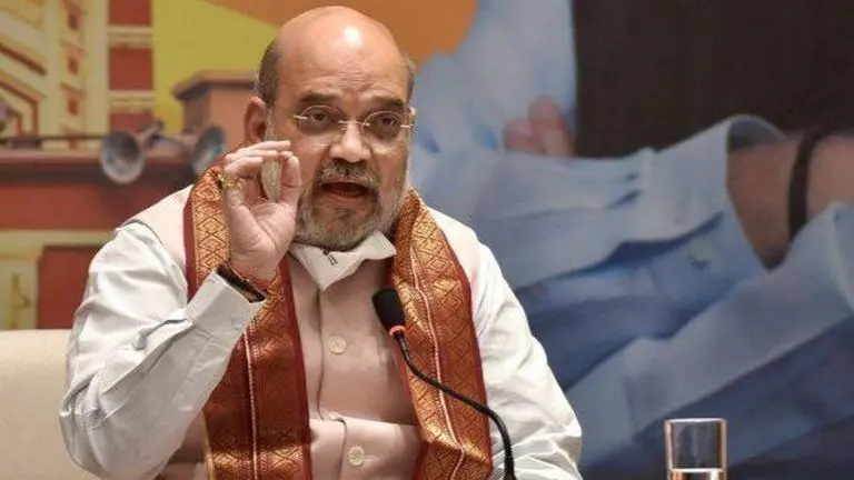 BJP govt in Karnataka will complete 5 year term & return to power again: Amit Shah