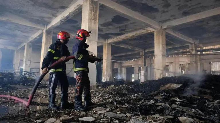 Police arrest Bangladesh factory owners after fire kills 52 factory
