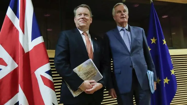 EU chief Brexit negotiator leaves talks, declines comment