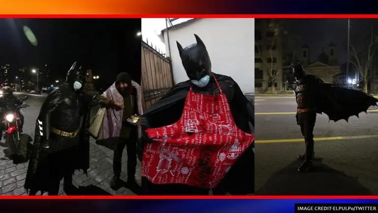 Man dressed as Batman delivers hot food to homeless in Chile's Santiago Man