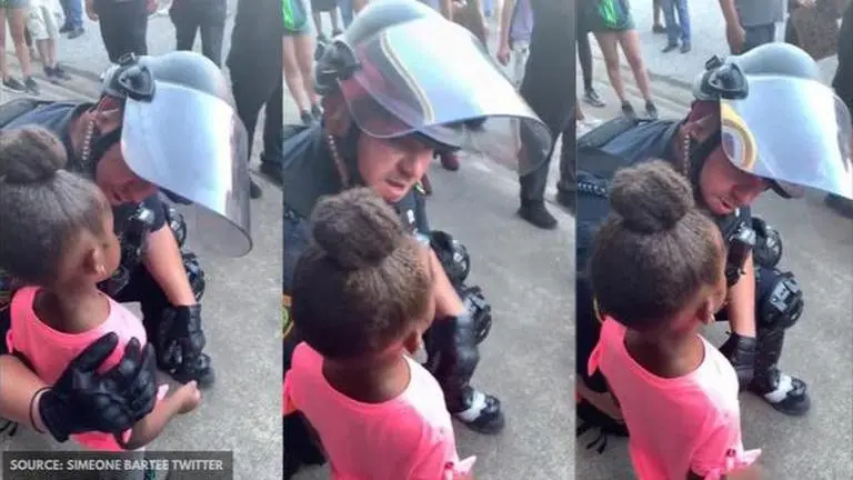 George Floyd protest: A cop comforting a 5-year-old leaves netizens emotional; Watch black lives matter