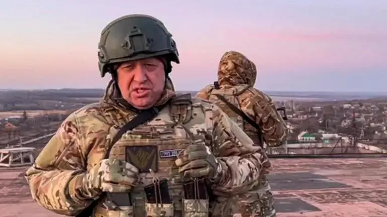 Flying Russian flags, more Wagner troops arrive in Belarus as part of deal that ended mutiny