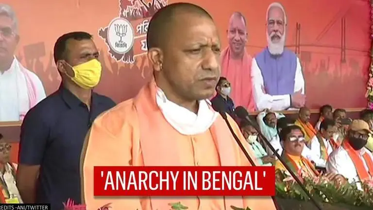 UP CM Yogi Adityanath takes on West Bengal counterpart Mamata Banerjee at Malda poll rally UP CM takes dig at Mamata Banerjee-govt at Malda rally, says, 'Bengal is land of change'
