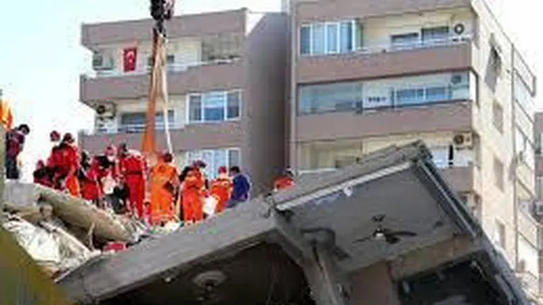 Turkish health minister Fahrettin Koca visits 16-year-old earthquake survivor in hospital