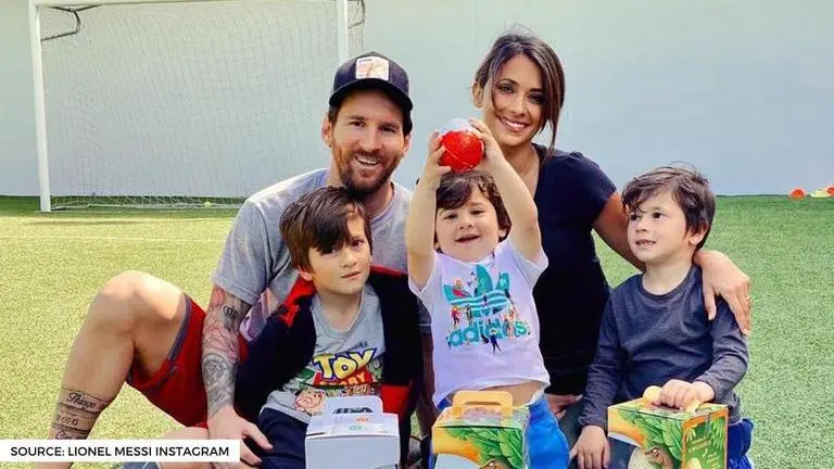 Messi and his kids play football with pet dog HULK while wife enjoys 'Messi' drink Messi