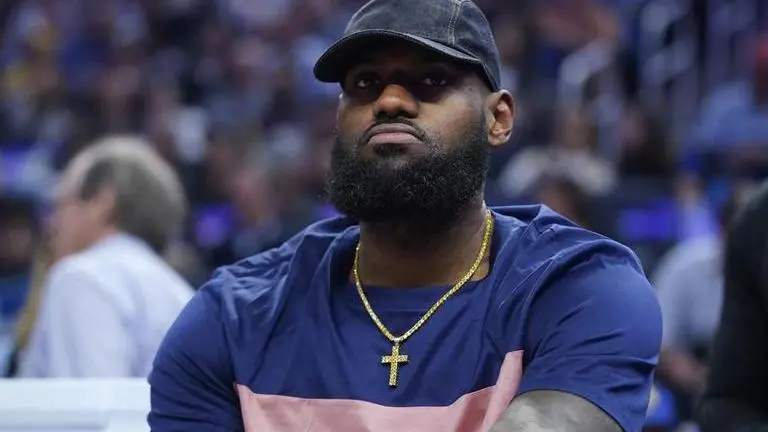 LeBron's 'Triple Logoman' trading card expected to fetch record price at auction