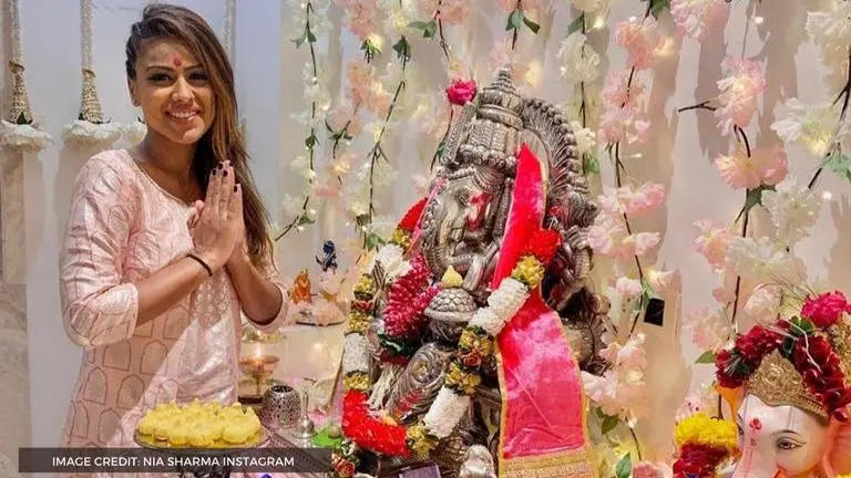 Nia Sharma's Ganpati celebrations included playing tug-of-war & posing for pics, See posts nia sharma