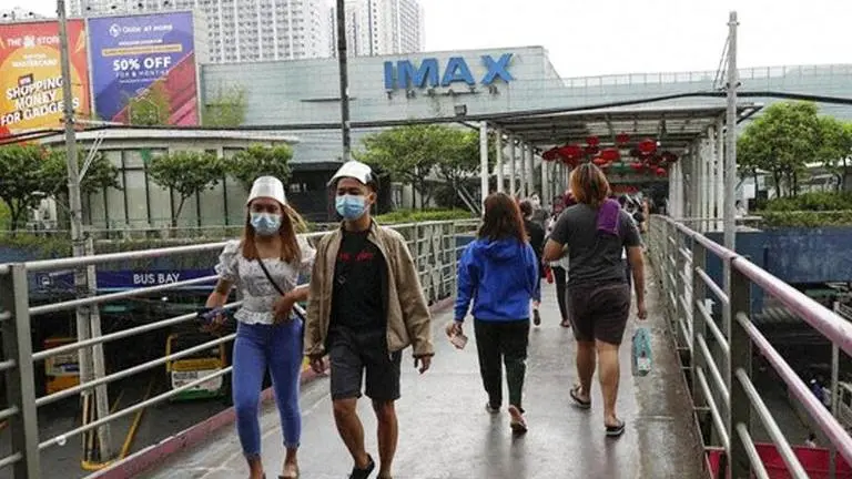 In Philippines, shaking hands, kissing babies banned during election campaign amid COVID Philippine