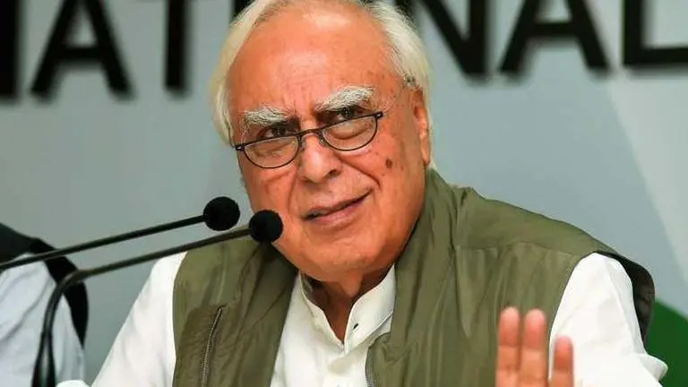 Kejriwal's 'subdued' response to CAA-NPR-NRC, Jamia-JNU violence 'smacks of opportunism': Sibal