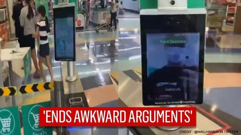 Thai shops install scanners to detect masks, temperature before allowing customers Thai