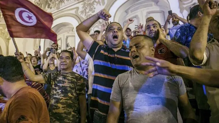 New constitution gives some Tunisians hope, others concern