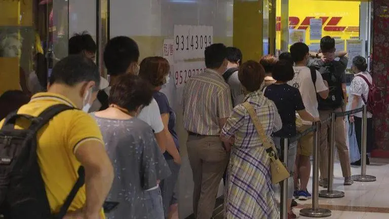 Hong Kong blocks Tiananmen vigil; rush on for UK passports