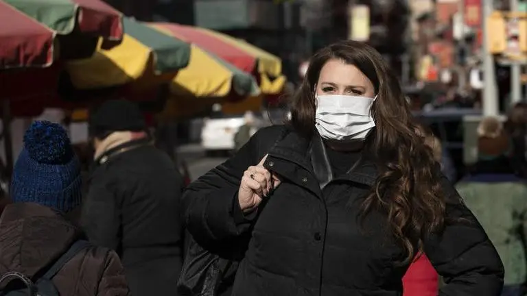 Authorities distribute free masks in Paris suburb