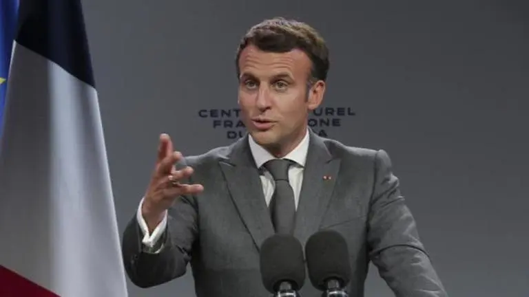 French President calls for COVID vaccine manufacturers to supplement G7 donations French