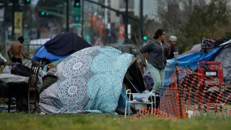 California rushes to try to contain virus among the homeless