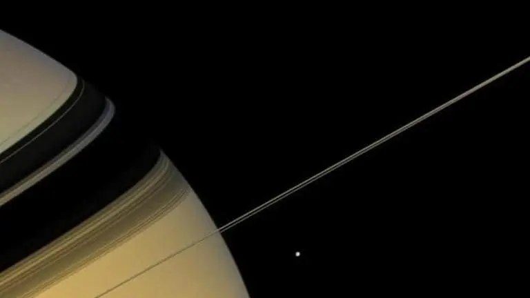 Cassini Spacecraft of NASA captures mesmerising picture of Saturn and its moon NASA