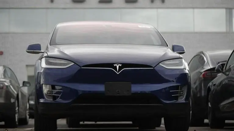 Tesla joins S&P 500, consumer confidence, new home sales