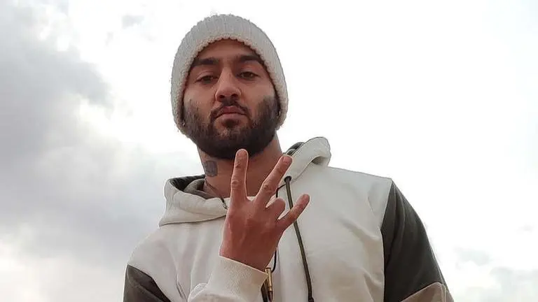 Rapper sentenced to more than 6 years in prison over protests in Iran, supporters say rapper