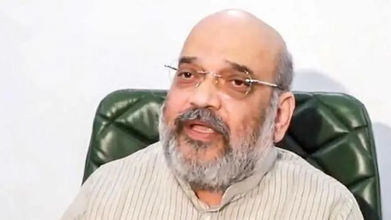 Shah speaks to Sonowal about the situation along Assam-Mizoram border Sarbananda Sonowal