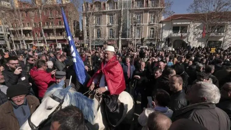 Albanian opposition disrupts parliament, supporters rally