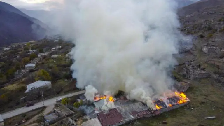 Villagers in Nagorno-Karabakh torch homes as they flee to Armenia in mass exodus Nagorno-Karabakh