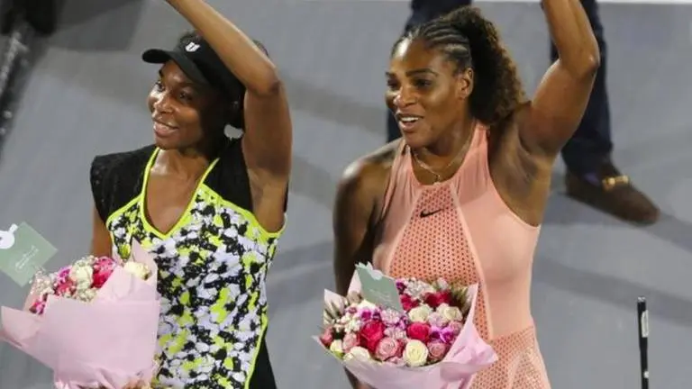 Stretch it out: Serena, Venus Williams offer fans yoga tips