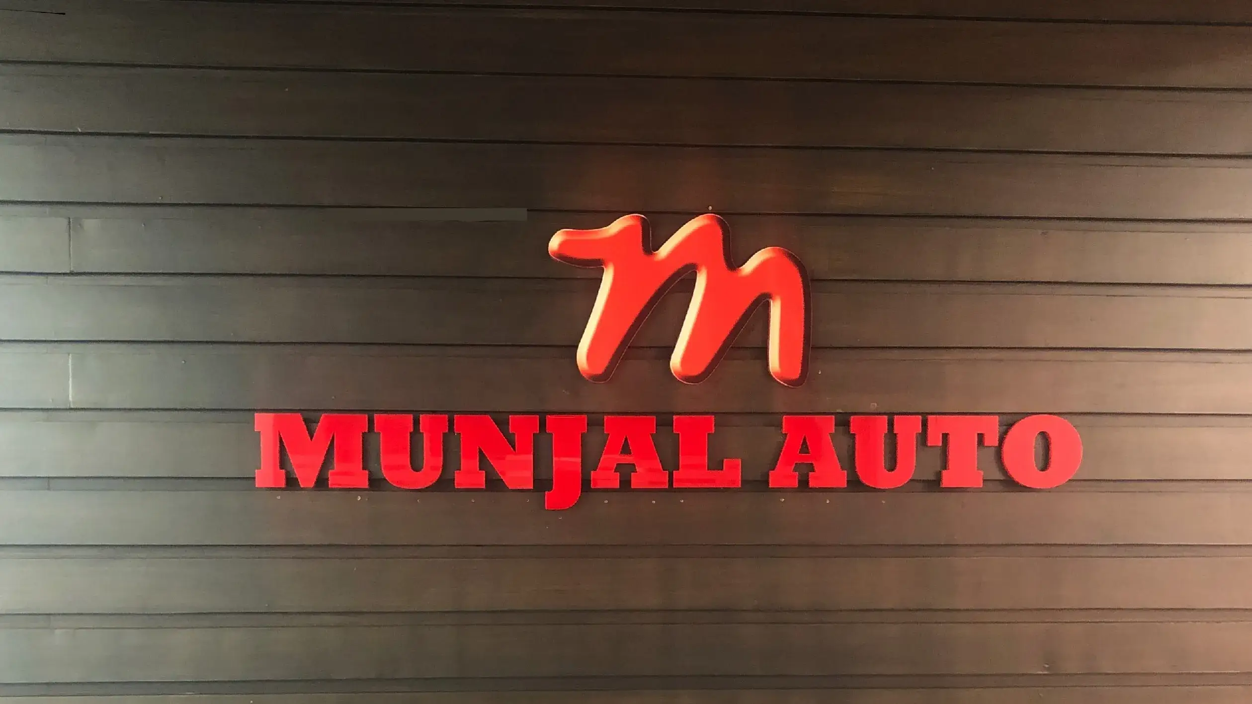 Munjal Auto hits 52week high after Tax demand reduced to Rs 70
