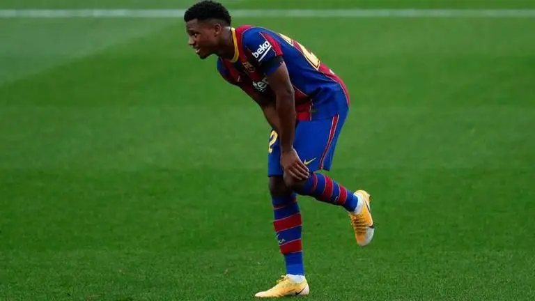 Barcelona's Ansu Fati injures knee, taken off at halftime