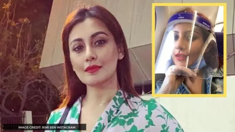 Actor Rimi Sen boards flight for Delhi; shares snippets of travel in times of COVID-19 Rimi Sen
