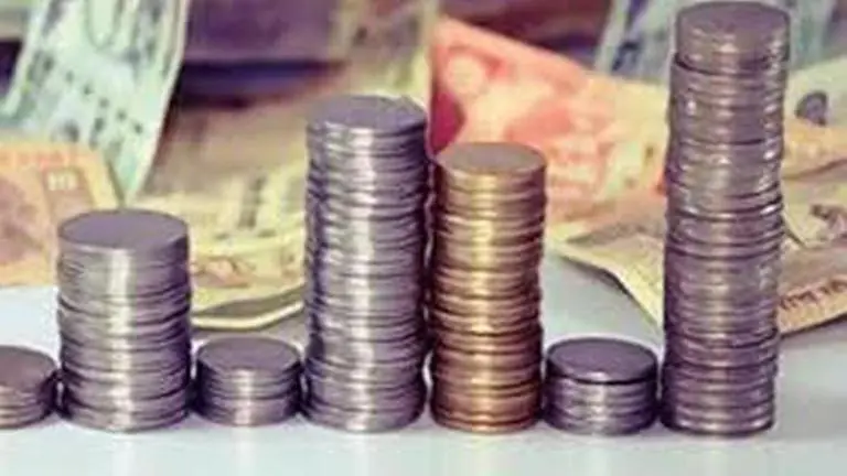 Rupee slips 30 paise to 71.27 as Moody's cuts India rating Moody