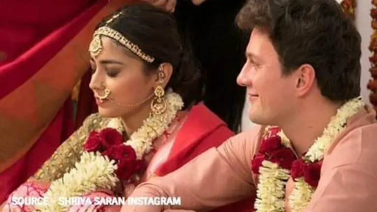 Shriya Saran shares adorable pics with hubby Andrei Koscheev, says "lift me up baby" Shriya Saran