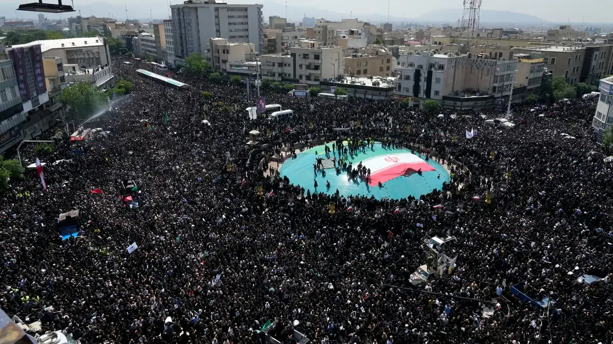 Iranians at late President Ebrahim Raisi's funeral ceremony