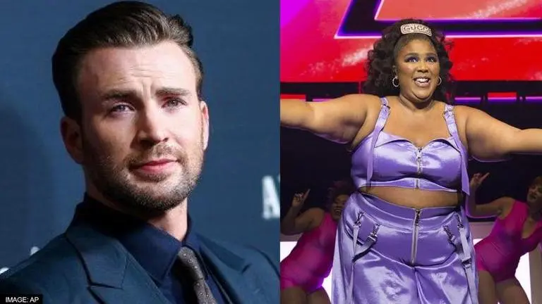Lizzo hilariously references rumours on pregnancy with Chris Evans during performance Lizzo