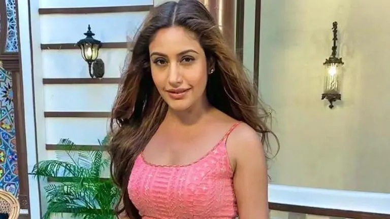 Naagin 5 actor Surbhi Chandna strikes a stunning pose in a ravishing red avatar Naagin 5