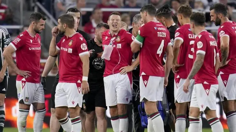 Wrexham striker Paul Mullin injured in collision with Manchester United goalie Nathan Bishop Wrexham striker Paul Mullin injured in collision with Manchester United goalie Nathan Bishop